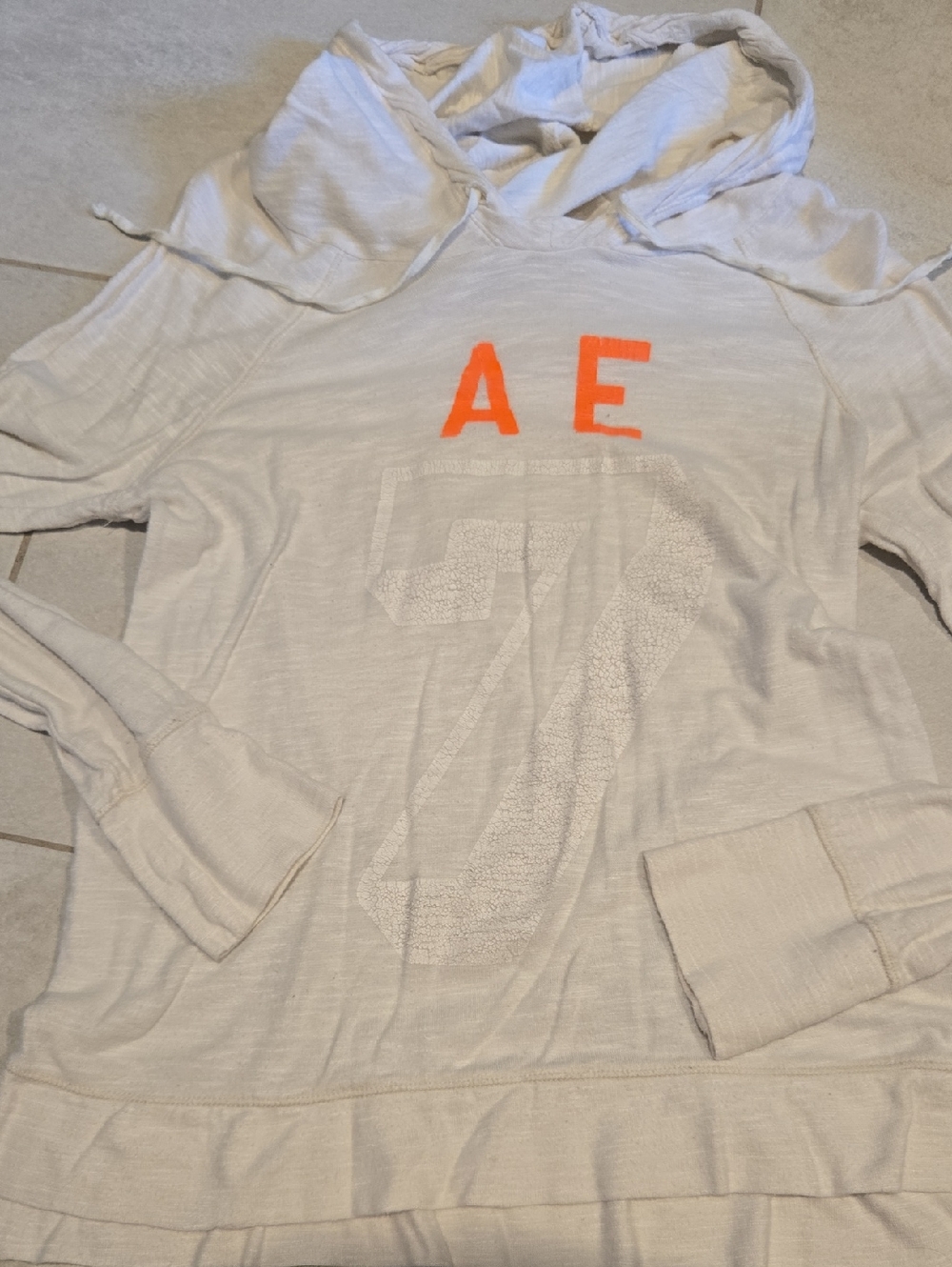 American Eagle Outfitters Cream Hooded Longsleeve Tee with Orange Logo Lettering